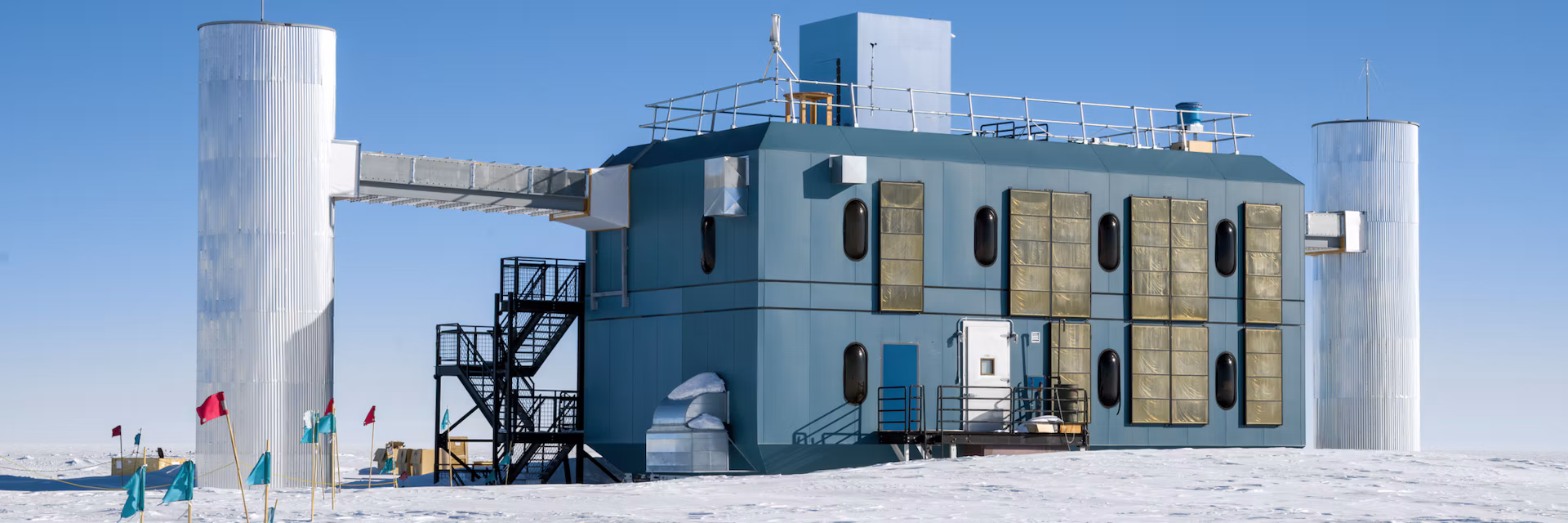 The IceCube Neutrino Observatory sits on tons of clear ice at the South Pole, allowing scientists to detect neutrino interactions. Cmichel67/Wikimedia Commons, CC BY-SA
